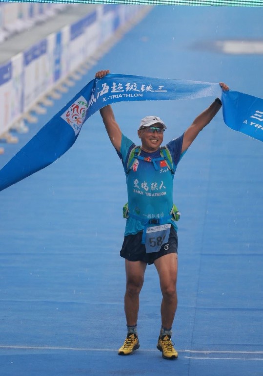 “鲲鹏径”全球铁人传奇之周忠岐:运动点燃生命的激情